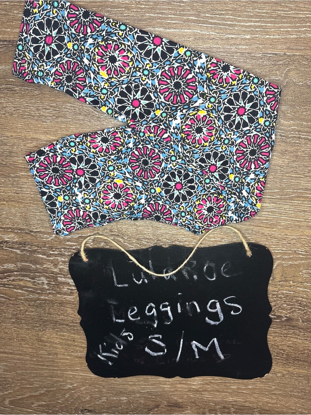 LuLaRoe Kids Black Leggings with Pink Blue Yellow Geometric Floral Print